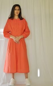 Orange Cotton Dress with Raglan Sleeves and Pleat Detailing. Full Front Open with Buttons.
